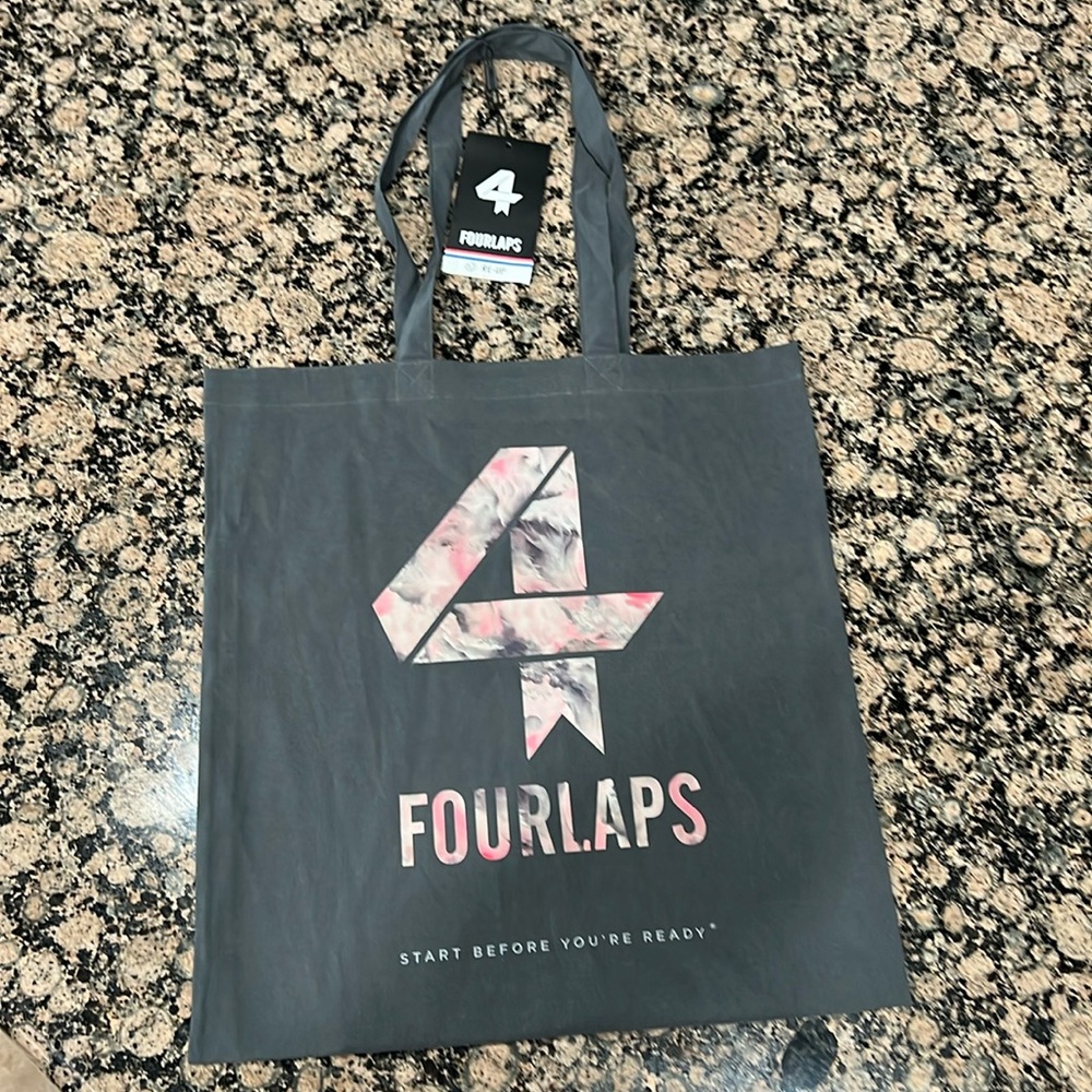4 laps tote bag
